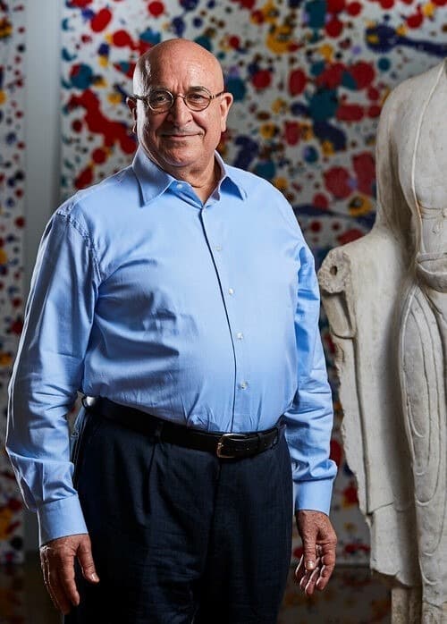 Fayez Barakat with one of his paintings